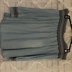 Denim look. Off the shoulder.